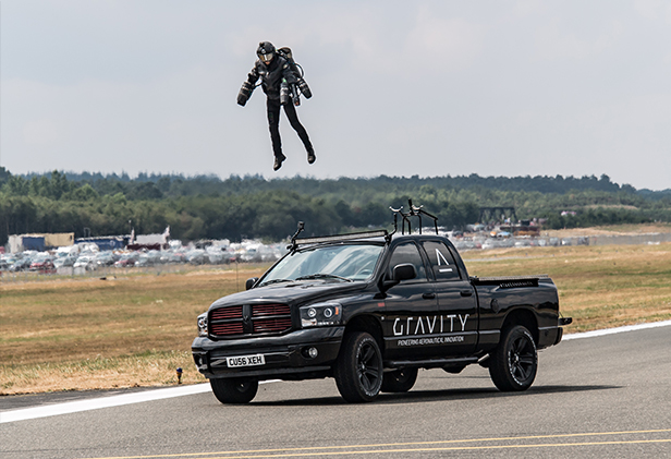 gravity flying over cars
